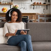 girl-with-tablet-watching-online-webinar-listeni-2022-01-21-19-24-58-utc.jpg